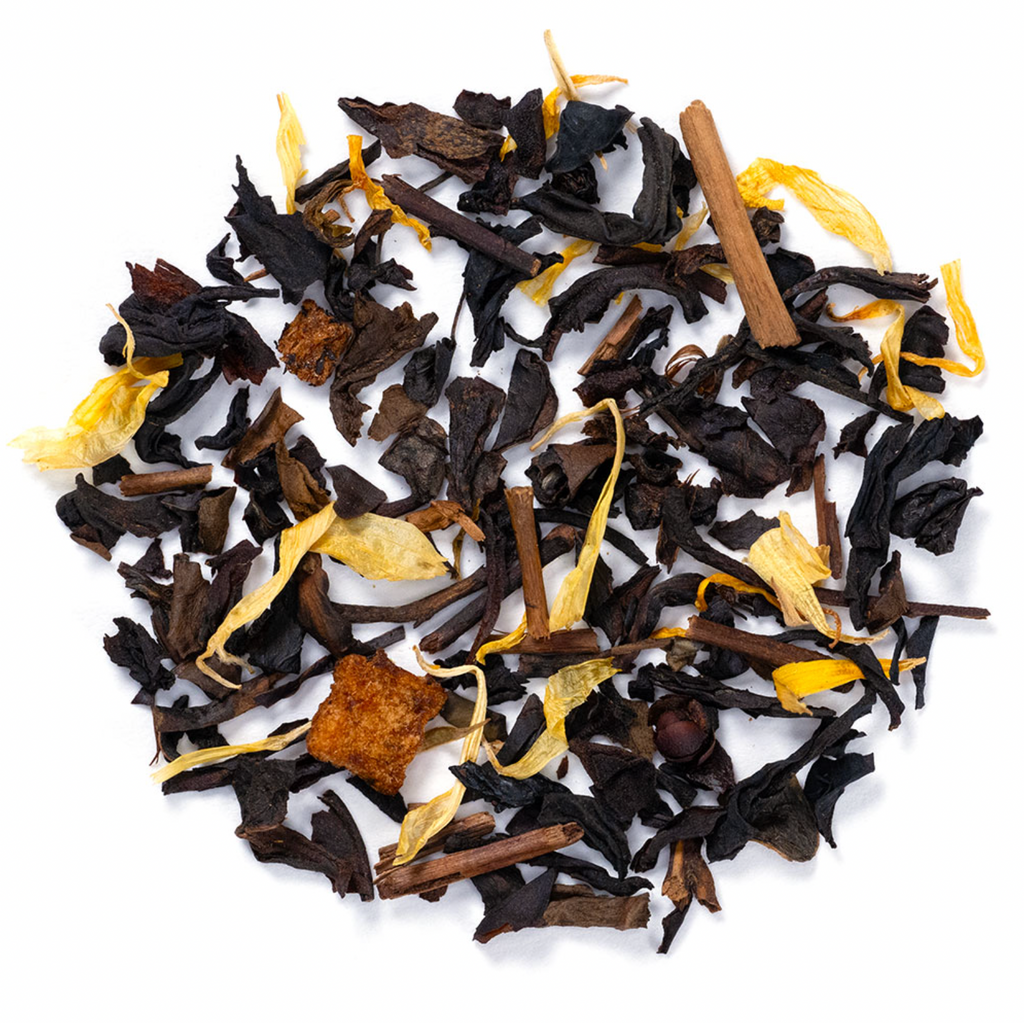 Close-up of peach oolong loose leaf tea with apple pieces, peach pieces and marigold petals